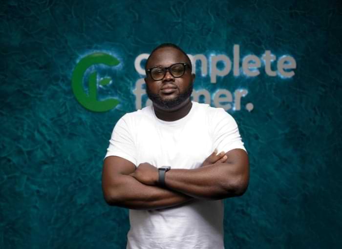 A person with his arms crossed
                                        Description automatically generated